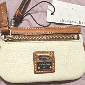 Dooney & Bourke White and Tan Clutch with Leather Trim.